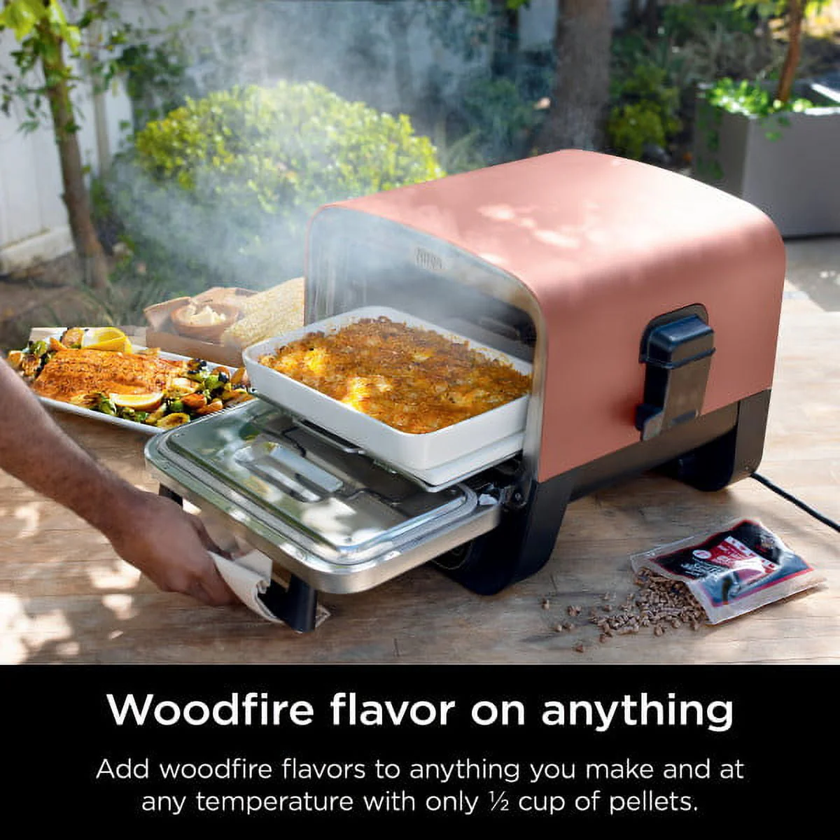 Ninja Woodfire�?8-in-1 Outdoor Oven, 700°F High-Heat Roaster, Artisan Pizza Oven, Foolproof BBQ Smoker with Ninja Woodfire�?Technology, Electric, OO101